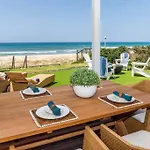 Absolute Beachfront Family Size Home