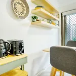 \'Buzzing Surfers\' Vibrant Indoor-Outdoor Lifestyle