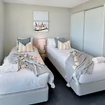 New 2 Level Coastal Luxe Penthouse With Rooftop
