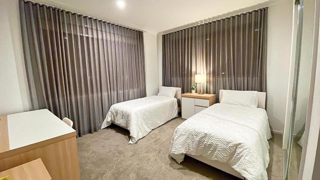 Grand Residences Near Helensvale Train Hospedagem domiciliar