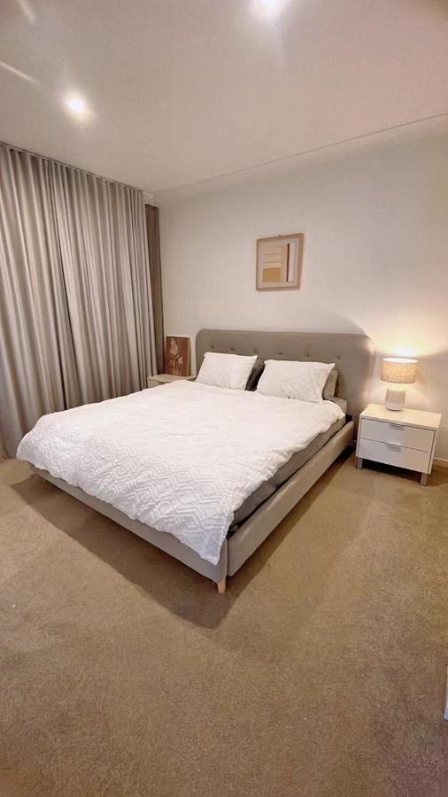 Hospedagem domiciliar Grand Residences Near Helensvale Train *