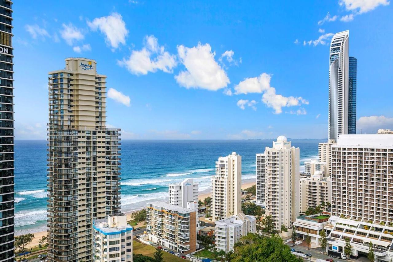 Energy And Poolside Serenity At Surfers Apartment