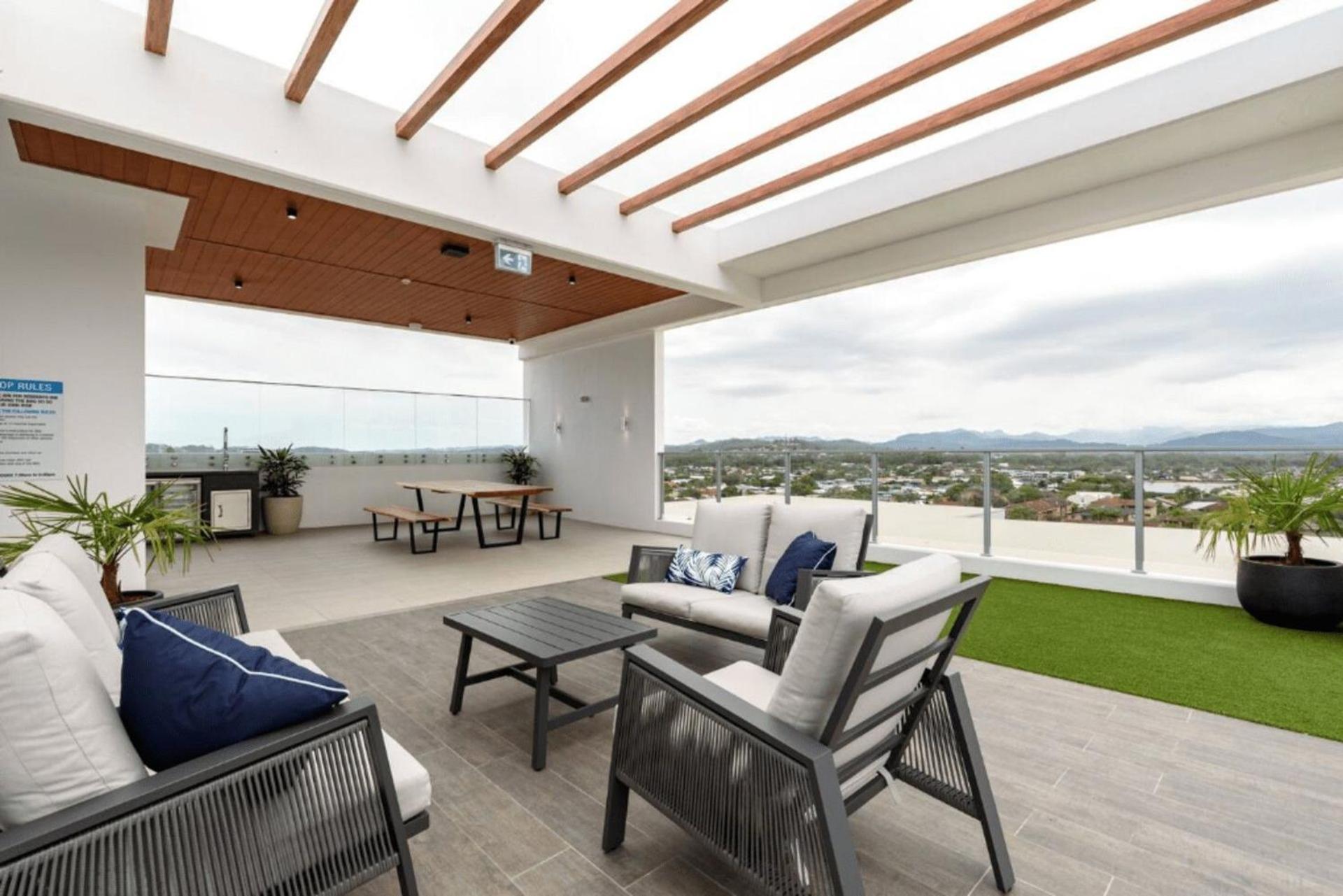Apartment Palm Escape With Rooftop Pool - Coasthm