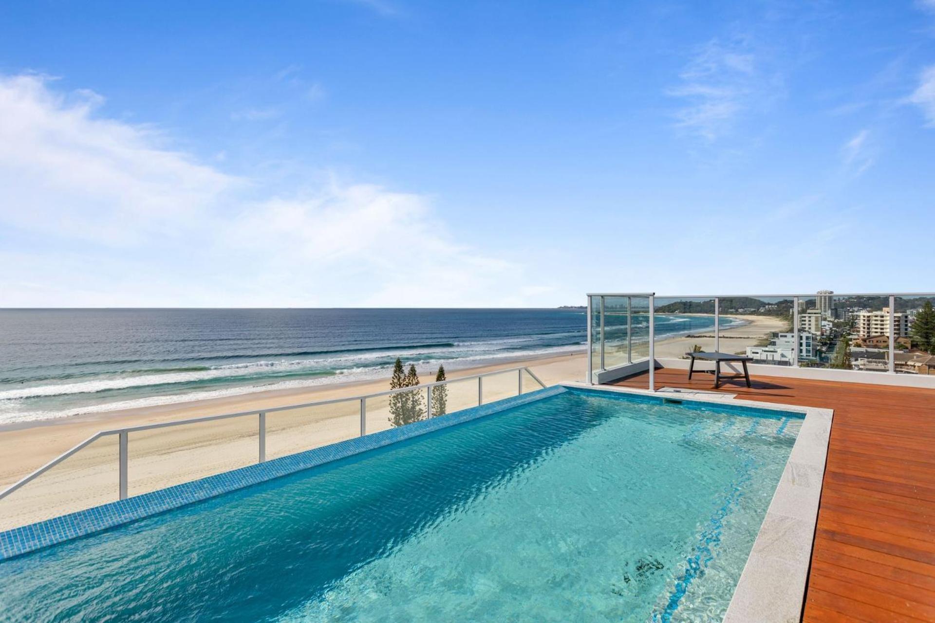Apartment Palm Escape With Rooftop Pool - Coasthm *