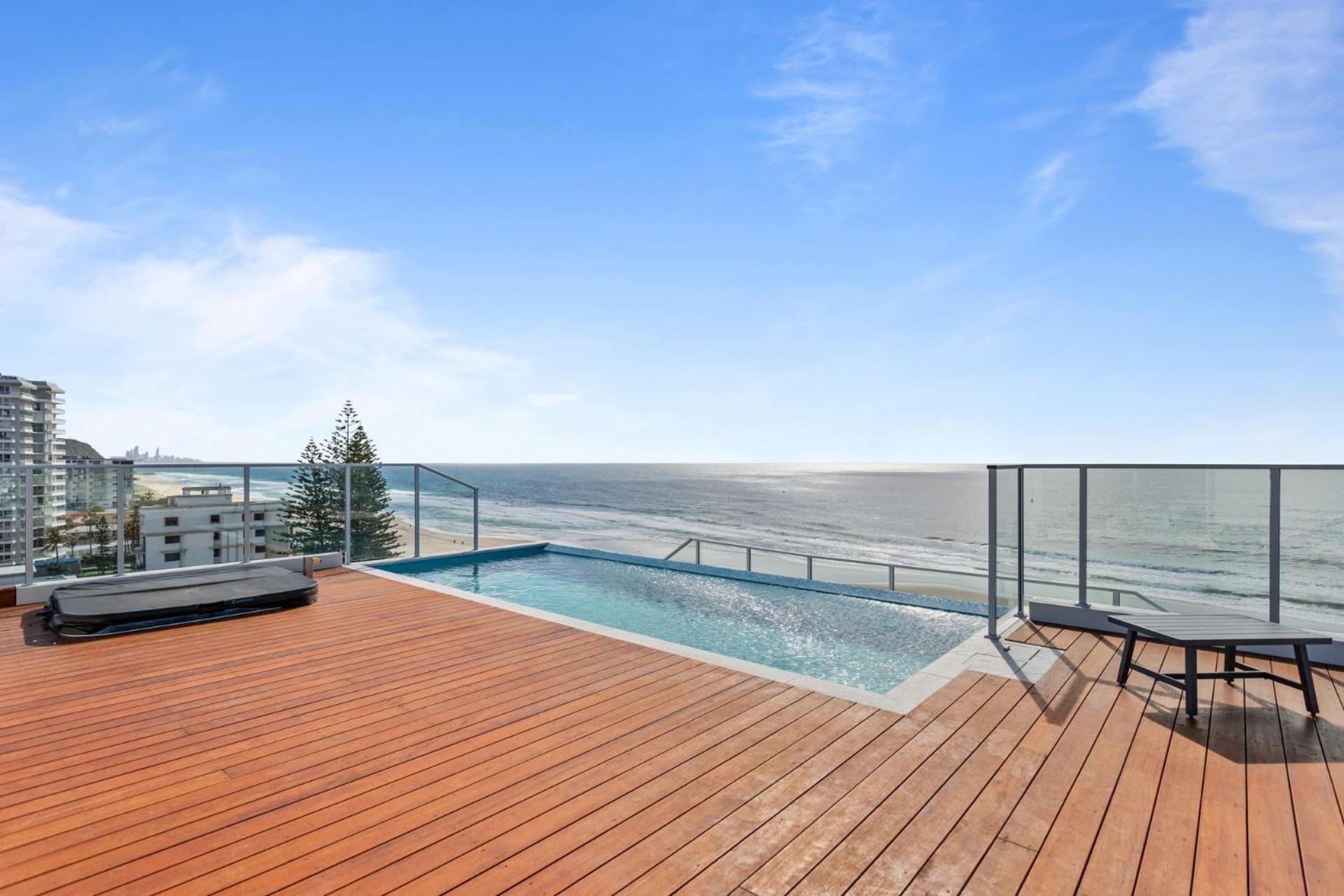 Palm Escape With Rooftop Pool - Coasthm Apartment