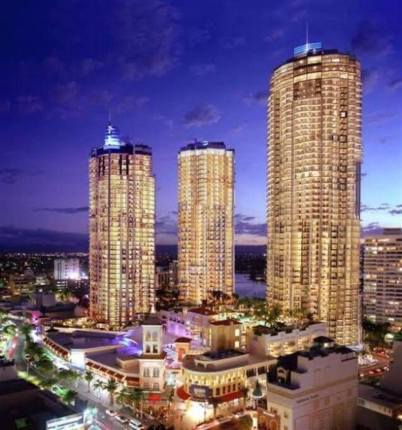 Coastal Charm At Chevron Towers Apartment